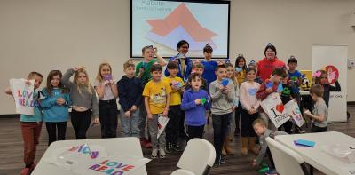 Children showing off their origami